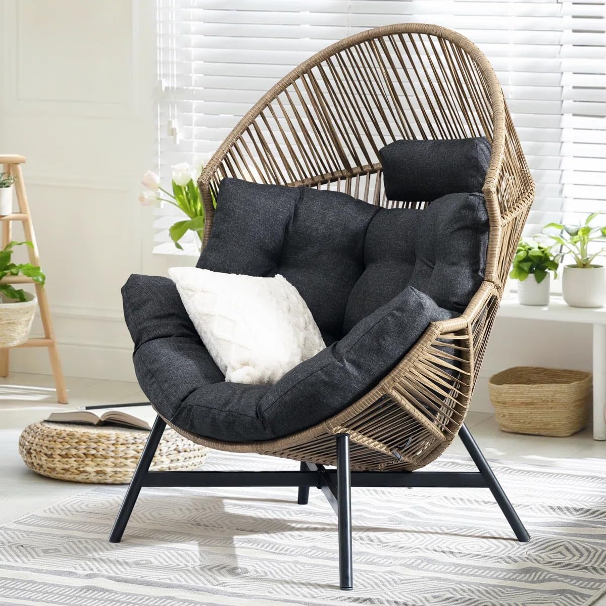 Teardrop papasan chair with onyx stone cushion, multi dark brown frame, and teardrop design for indoor lounge seating