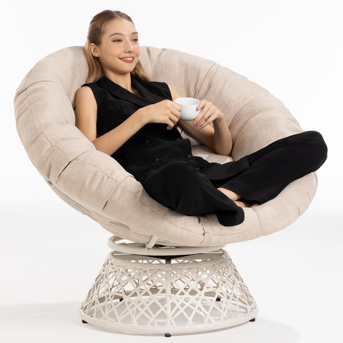 Papasan chair with sepia sand cushion and white frame for indoor lounge seating