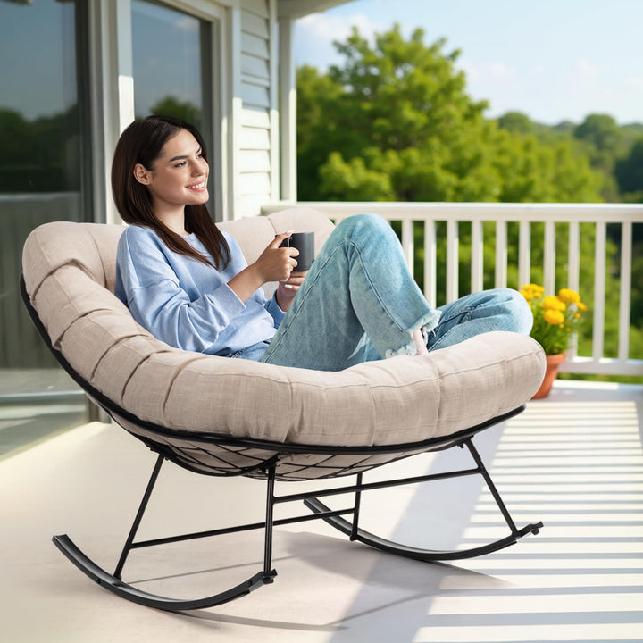 Metal moon rocking chair with ottoman with beige cushion and black matte frame; for everyday rocking seating