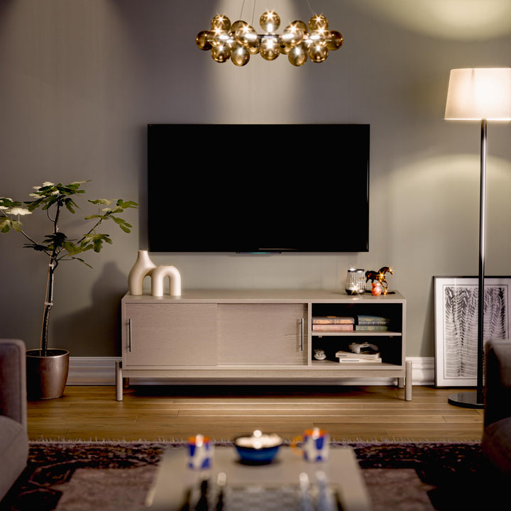 Lyra TV stand with 65-inch design, light grey finish, and media storage; for a home entertainment area