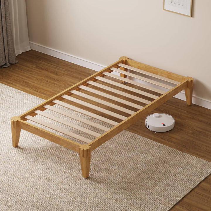 Chalipa twin platform bed frame, featuring light natural finish, for a platform bed setup