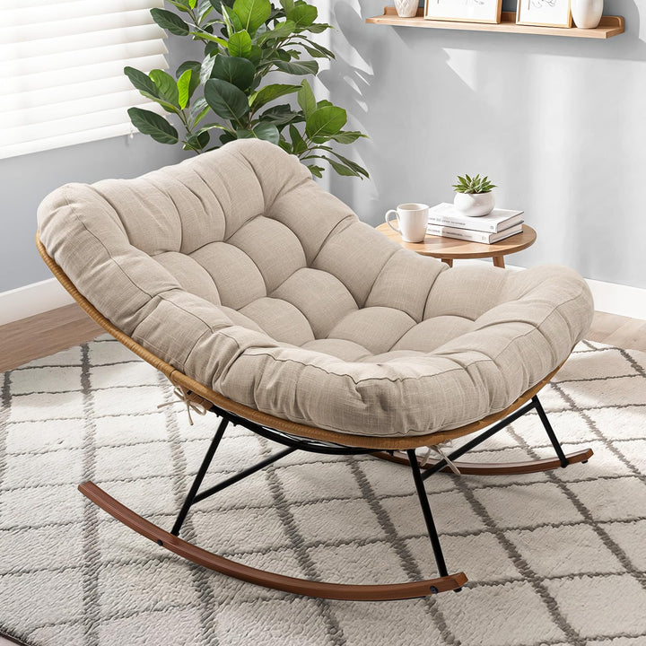 Metal moon rocking chair with beige cushion and wood-texture frame for indoor reading