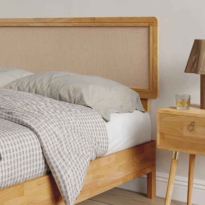 Nipe queen platform bed frame designed with headboard, solid rubber wood, and light natural finish for sleep space