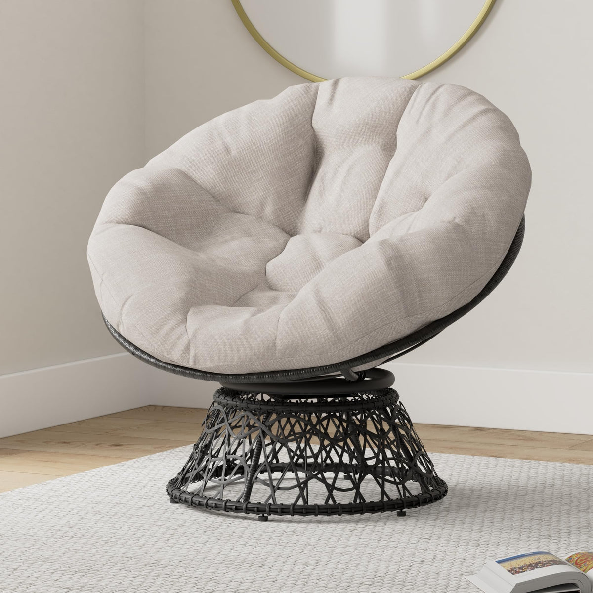 Papasan chair, featuring silver cloud cushion and black frame, for a reading corner