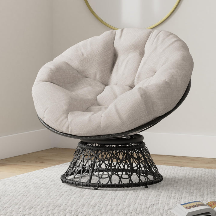 Papasan chair, featuring silver cloud cushion and black frame, for a reading corner