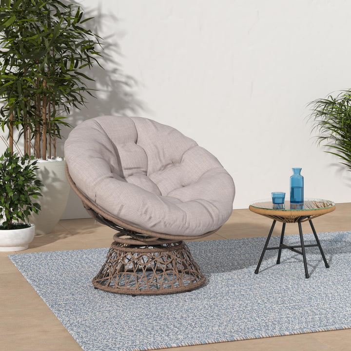 Papasan chair, featuring silver cloud cushion and brown frame, for a reading corner